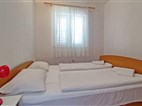 Apartmány ROIĆ - dvoulůžková ložnice a denní místnost - typ APT. 2+2 TERASA