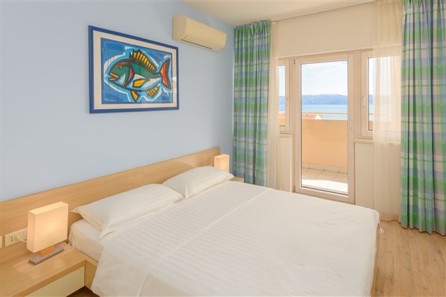Apartmány WYNDHAM GRAND Resort - dvoulůžková ložnice a denní místnost - typ APT. 2+1 Premium Family M