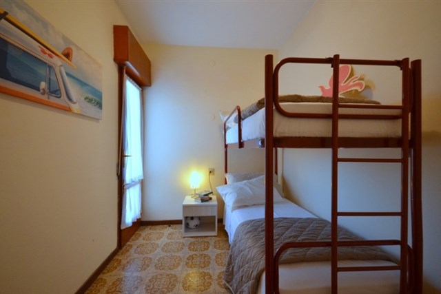Apartmány TORRE PANORAMA - třílůžkový pokoj, pokoj s palandou a denní místnost - typ APT. 5+2 C-7