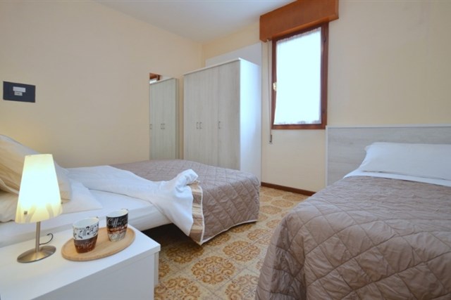 Apartmány TORRE PANORAMA - třílůžkový pokoj, pokoj s palandou a denní místnost - typ APT. 5+2 C-7